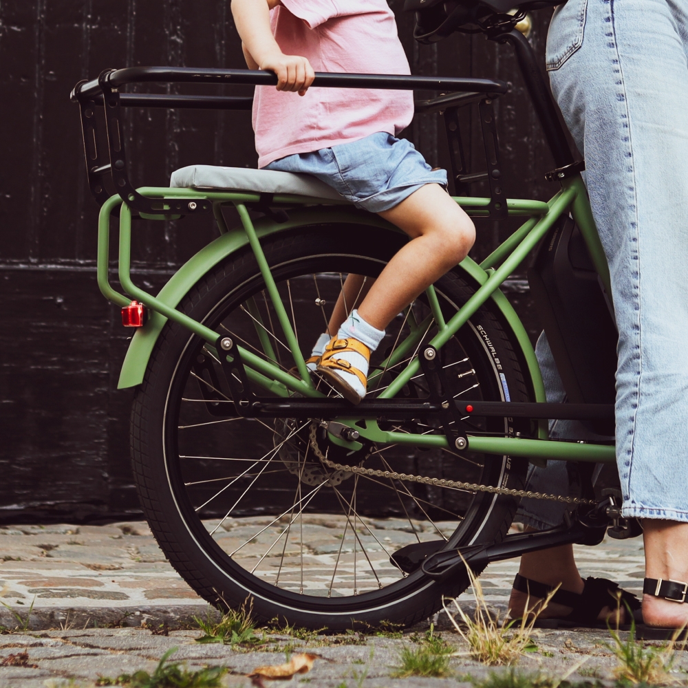 Selle enfant repliable sur cadre de vélo, avec repose pieds